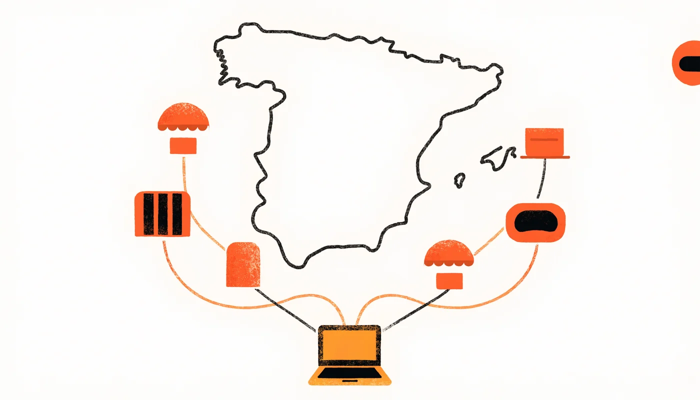 Mesa de trabajo con un portátil, un documento de solicitud y el logotipo genérico de un programa de ayudas a la digitalización